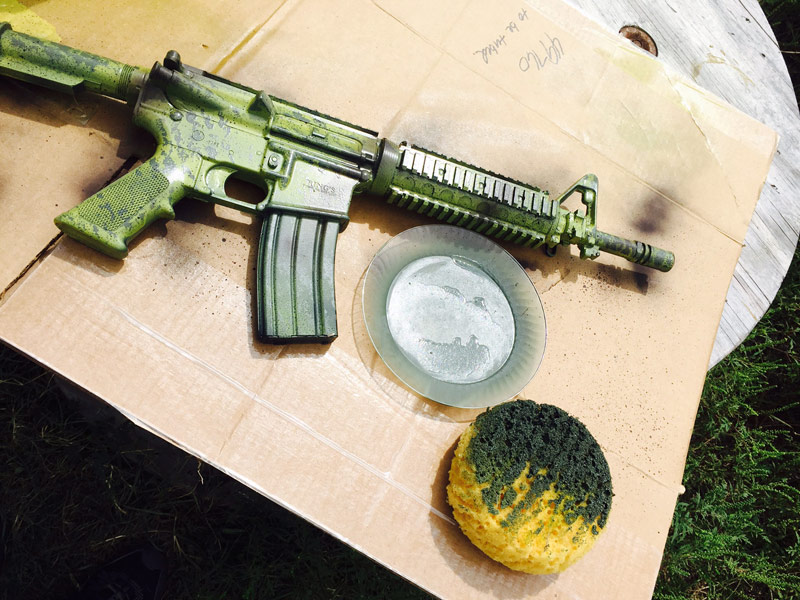 first coat green paint on black rifle 2