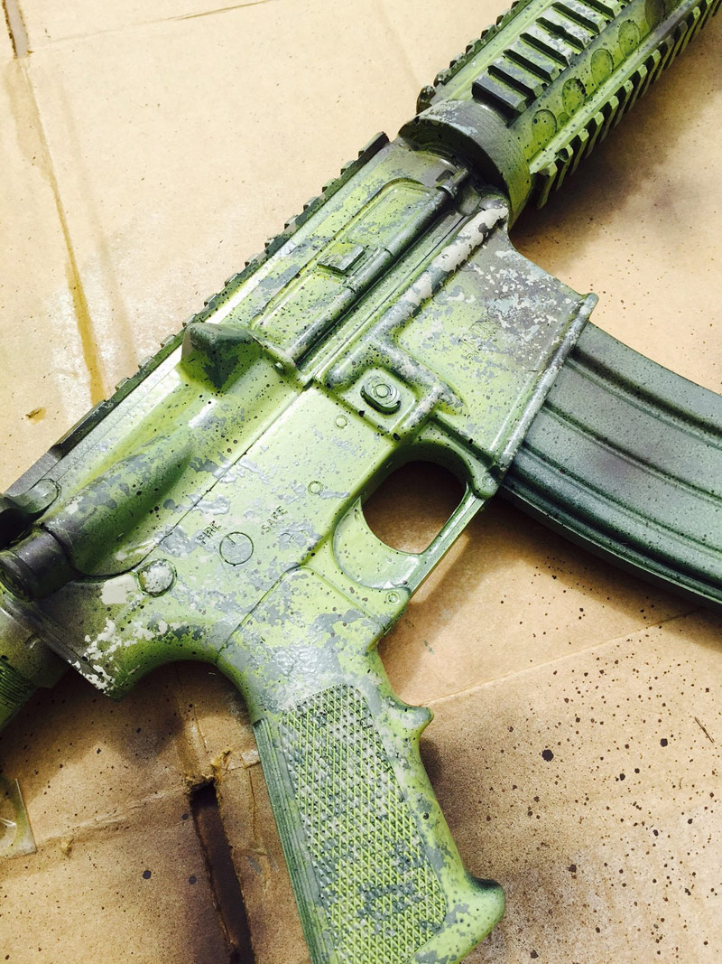 finished camo paint on black rifle